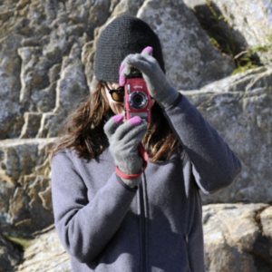Maria shooting her camera in Acadia National Park